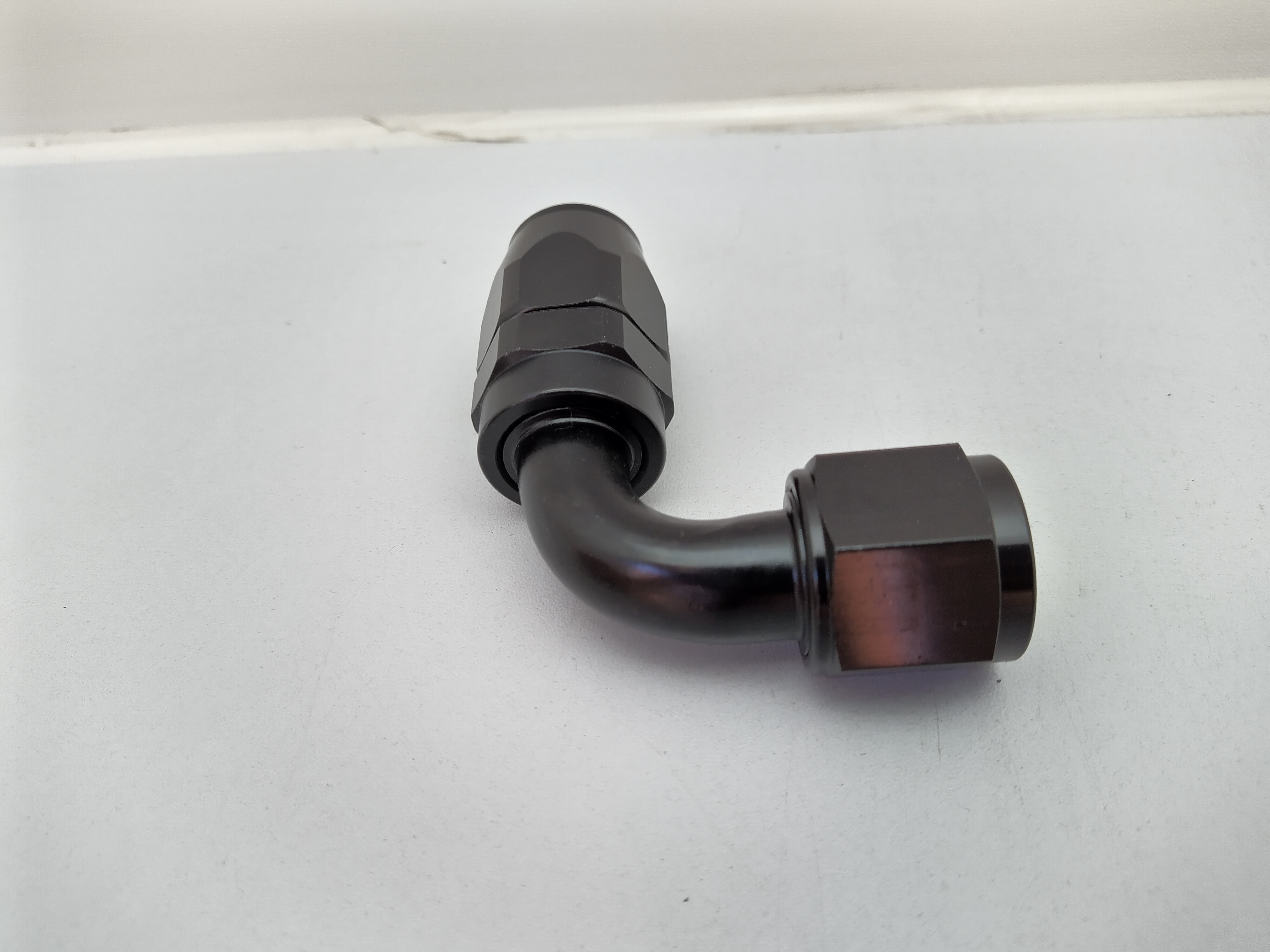 Alu-Fitting schwarz AN10 Dash 10 90°
