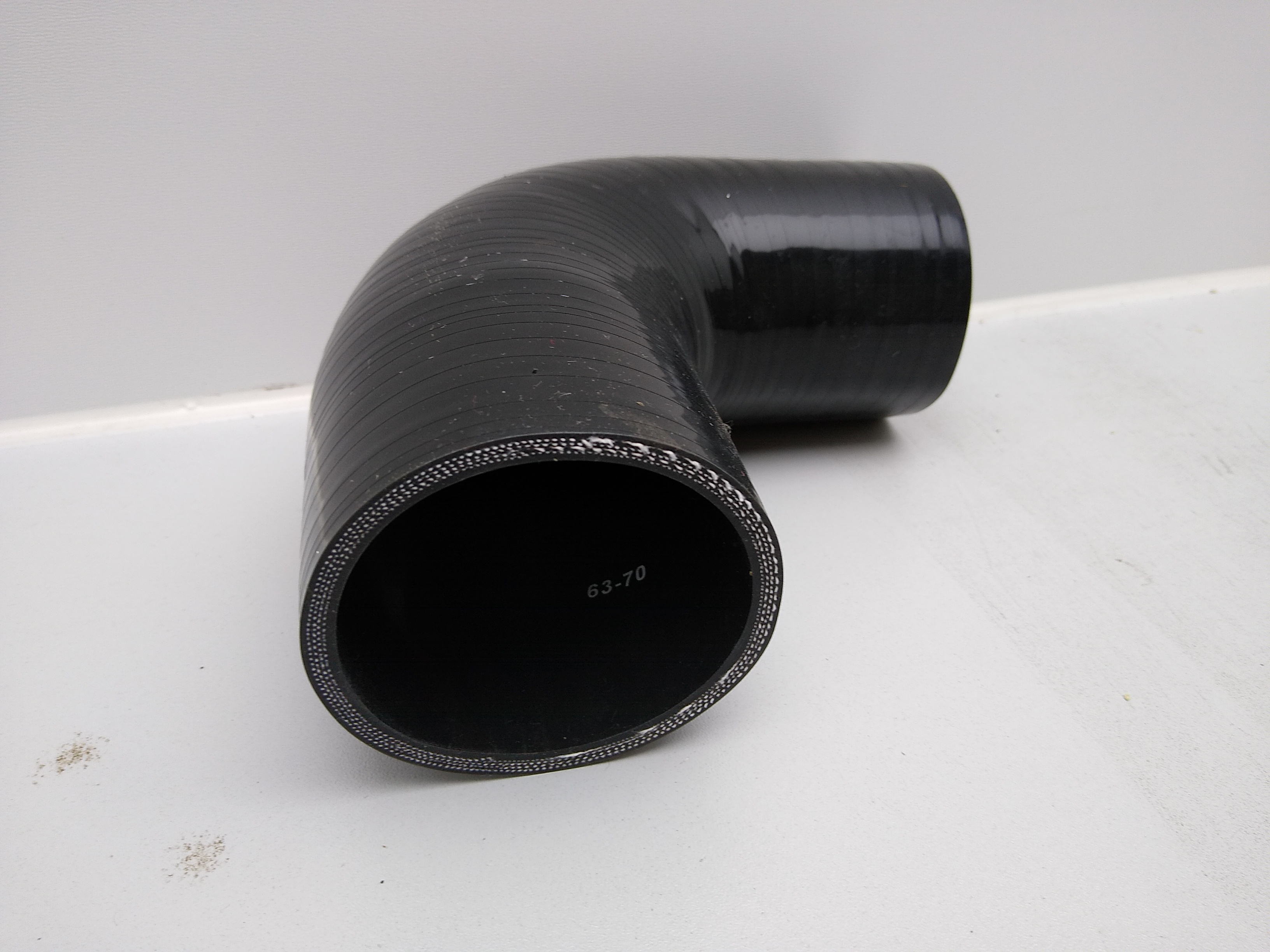 Silikonreduzierbogen 90 Grad 70>63mm