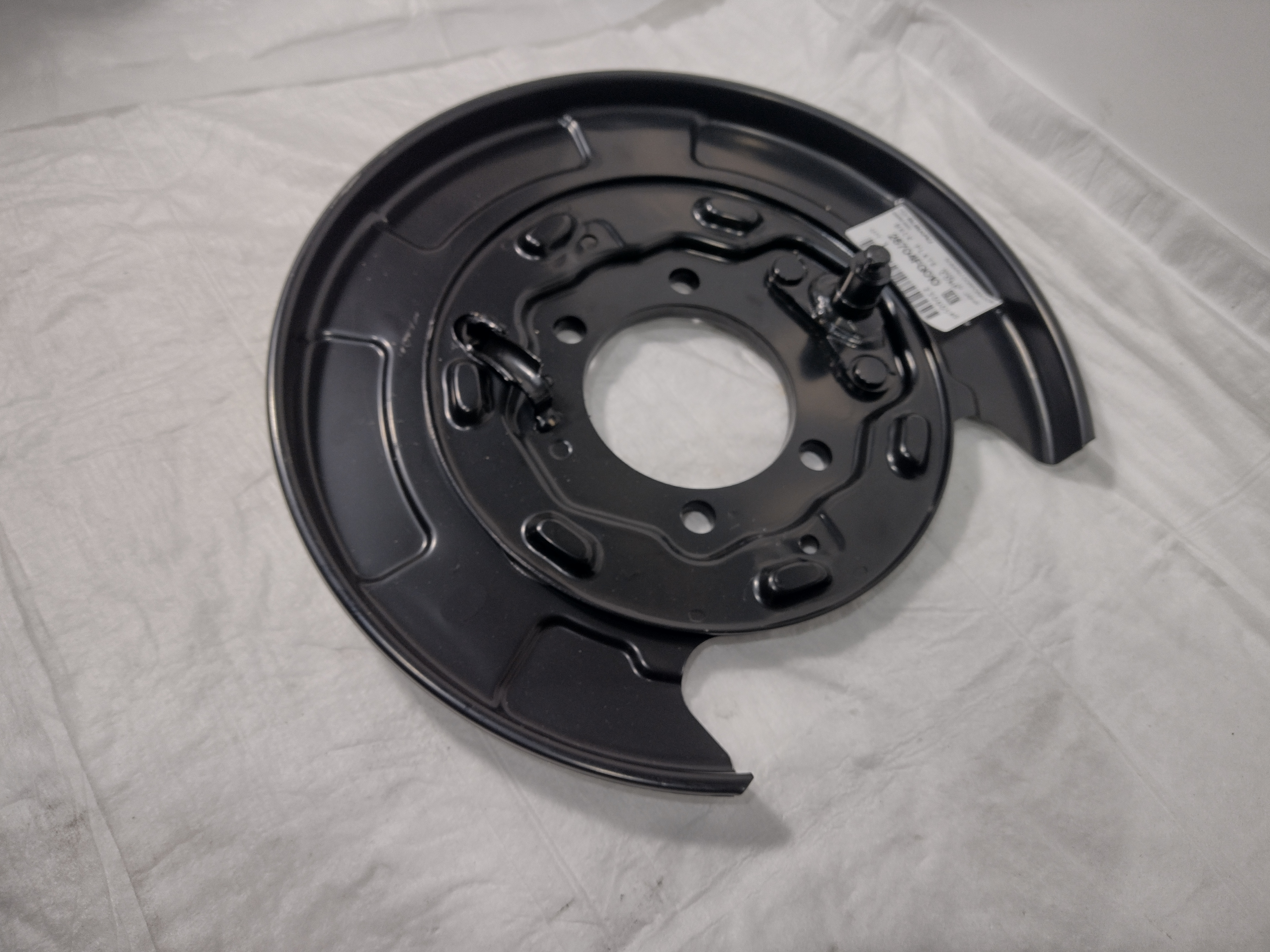 Ankerblech hinten links für Subaru Impreza 2008+, Forester 2008+ 26704FG010