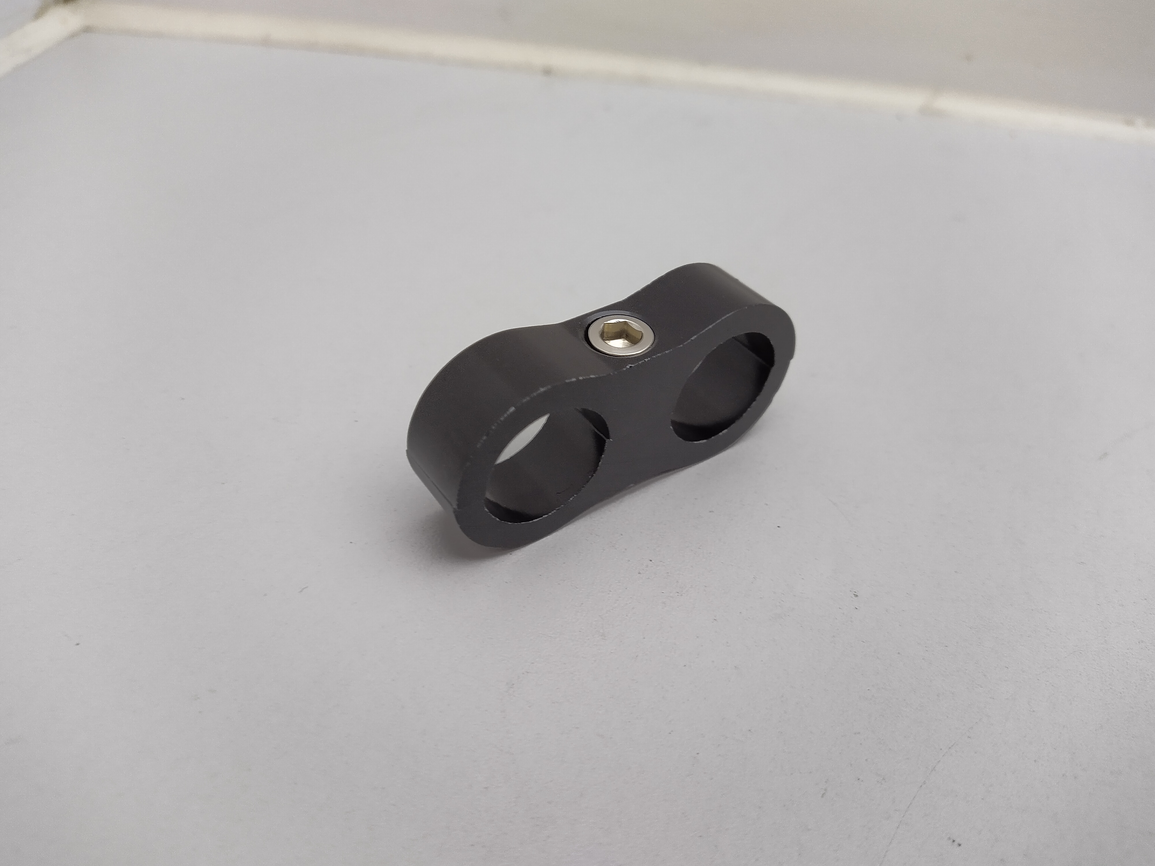 Schlauchhalter 2x19,5mm schwarz(Dash 10 AN10)