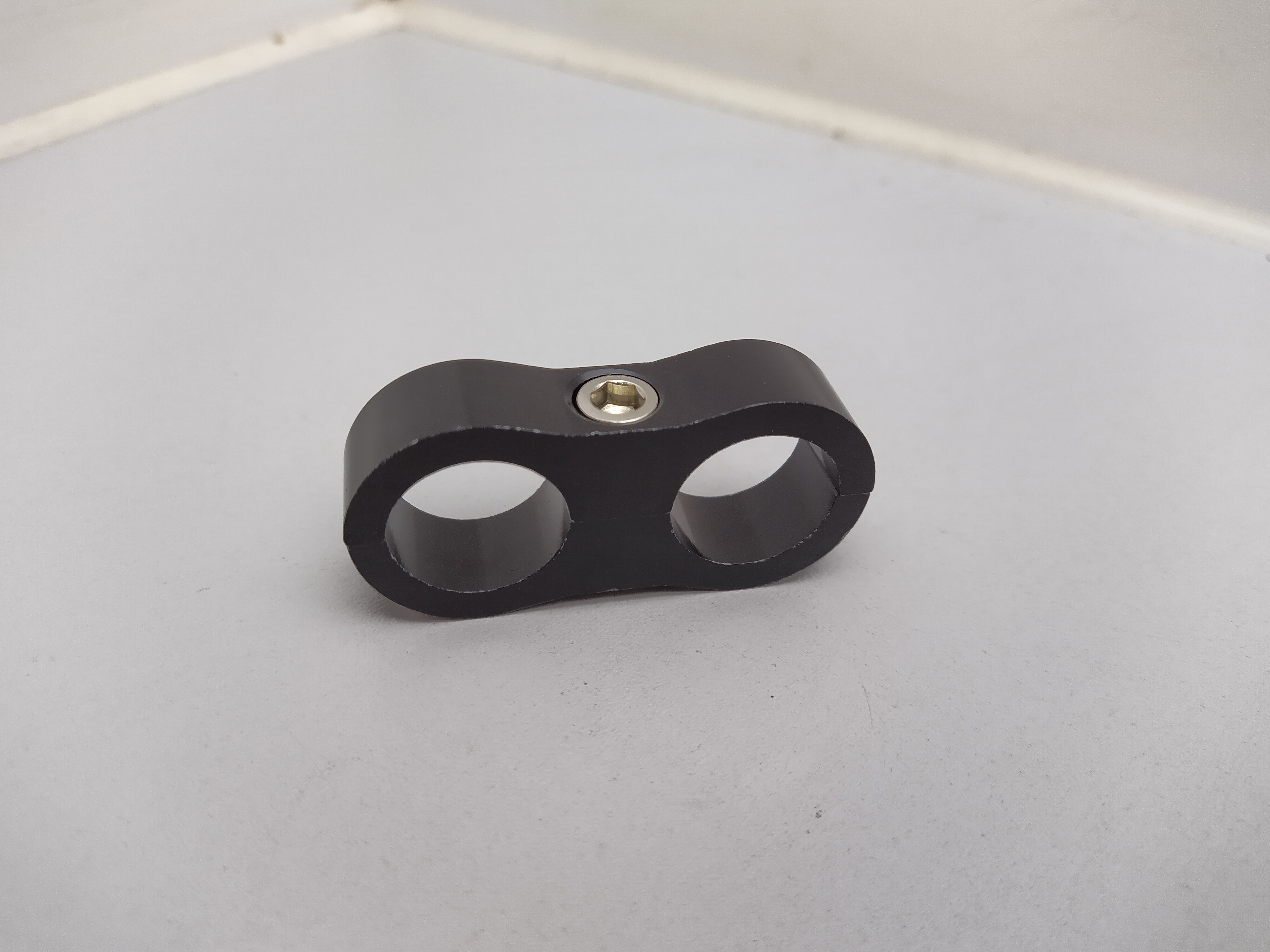 Schlauchhalter 2x19,5mm schwarz(Dash 10 AN10)
