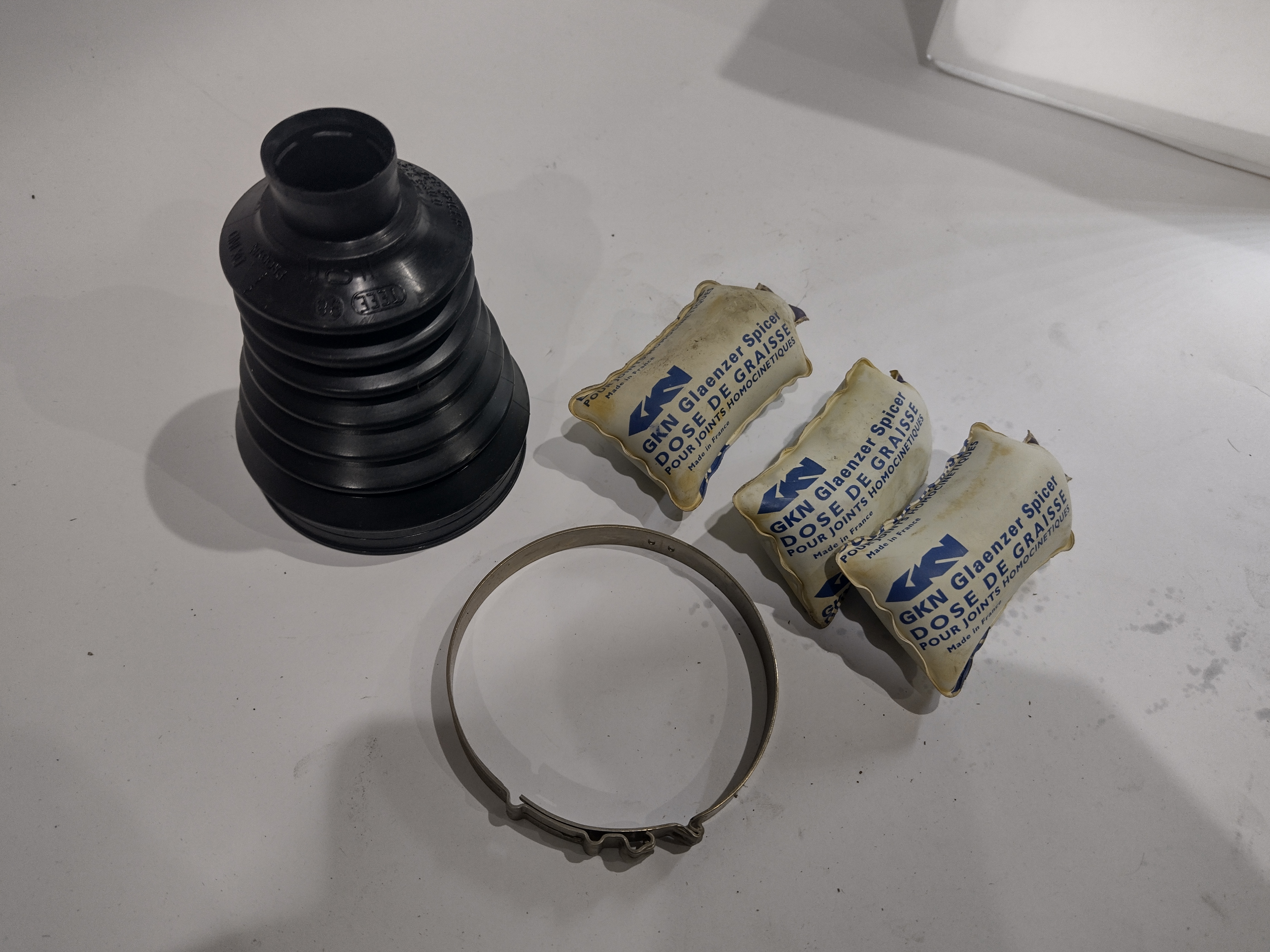 Peugeot / Citroen Manschettensatz Radseite links 329312 NEU NOS NEW